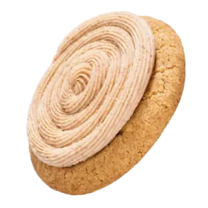 A churro cookie featuring a smooth swirl of cream on top, highlighting its tempting and indulgent appearance.
