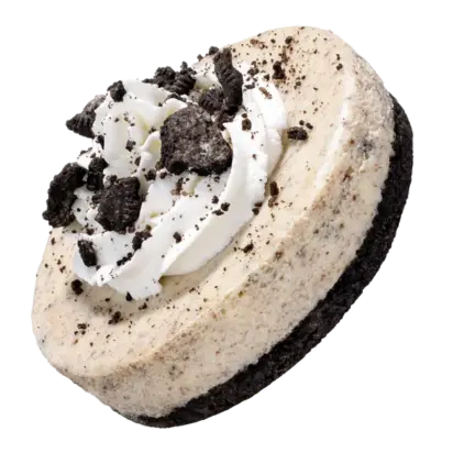 Crumbl Cookies Last Week menu 4 A creamy cheesecake topped with crushed cookies, showcasing a delicious cookies and cream flavor.