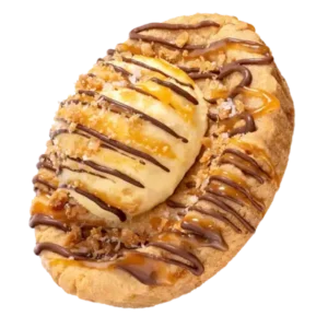 Sea salt toffee skillet cookie topped with ice cream and drizzled with rich chocolate sauce.