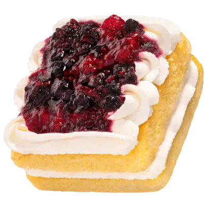A fluffy double-stacked vanilla shortcake layered with fresh whipped cream and our house-made triple berry jam. Sweet, fruity, and perfectly light.